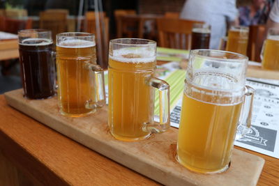 Close-up of beer glass on table