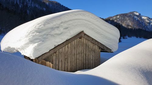 Snow covered mountain against sky