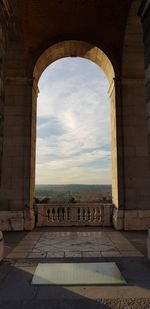 View of old building against cloudy sky
