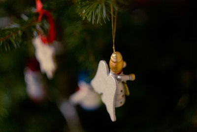 Close-up of christmas decoration hanging on tree