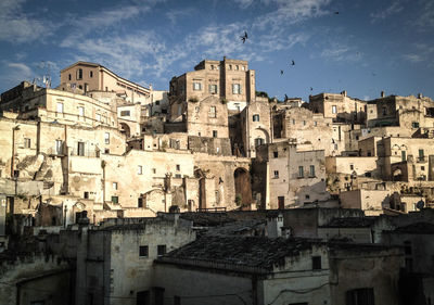 Old buildings against sky