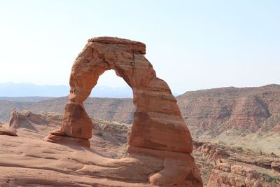 Scenic view of delicate arch at arches national park against sky