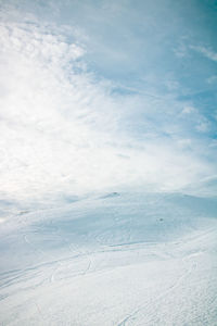 Scenic view of snow covered mountain against sky