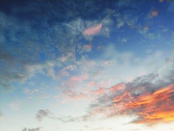 Low angle view of cloudy sky during sunset