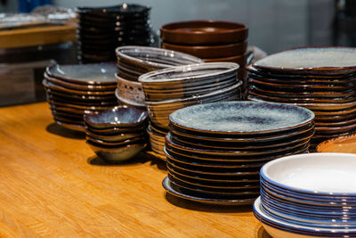Close-up of plates on table