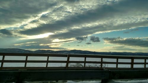 Scenic view of mountains against cloudy sky