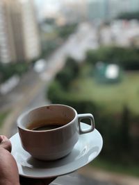 Close-up of coffee cup on table