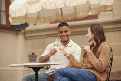 Couple celebrating on patio