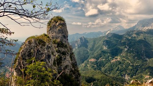 Panoramic view of trees on mountain against sky