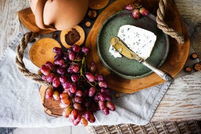 High angle view of fruits on cutting board