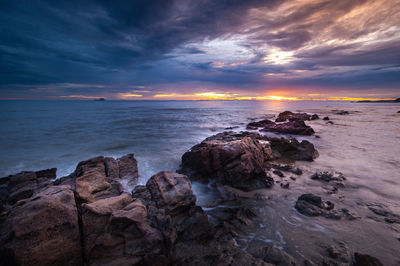 Scenic view of sea against sky during sunset