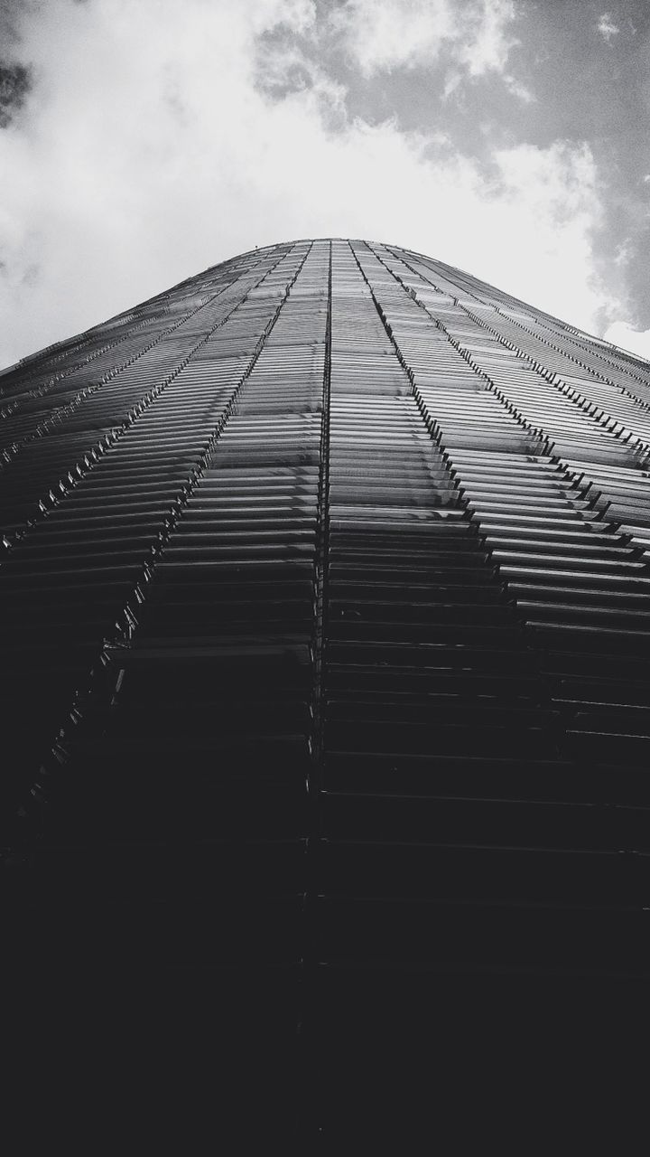 building exterior, architecture, low angle view, built structure, sky, modern, skyscraper, office building, tall - high, city, building, cloud - sky, tower, cloud, day, outdoors, glass - material, no people, tall, cloudy