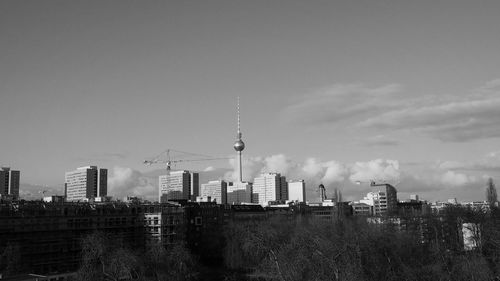 Fernsehturm tower with cityscape against sky