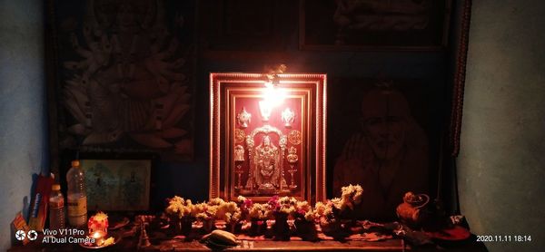 Lit candles in temple