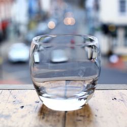 Close-up of water glass on table