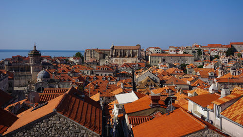 High angle shot of townscape against clear sky