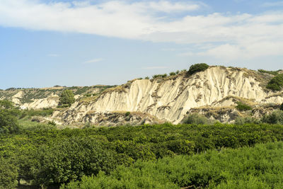 Scenic view of land against sky