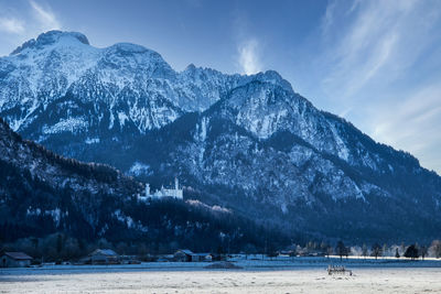 Castle, mountain and dramatic sky. winter, landscape.