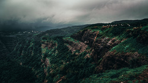 Scenic view of land against sky