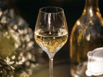 Close-up of wineglass on table