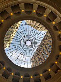 Low angle view of skylight in building