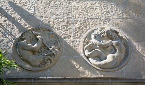 Close-up of statue against wall