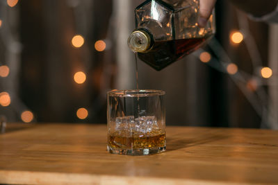 Close-up of wine glass on table