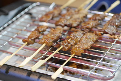 Close-up of food on barbecue grill