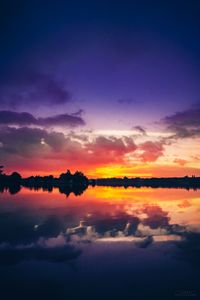 Scenic view of silhouette trees against sky during sunset