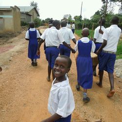 Full length of woman standing by railing