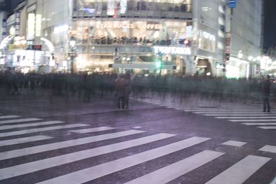 View of street in city at night