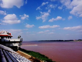 Scenic view of sea against cloudy sky