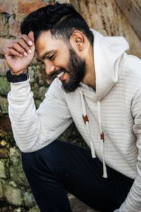 Young man looking away outdoors