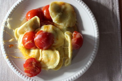 High angle view of breakfast served in plate on table