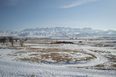 Steppe landscape surrounding burana tower during winter in kyrgyzstan