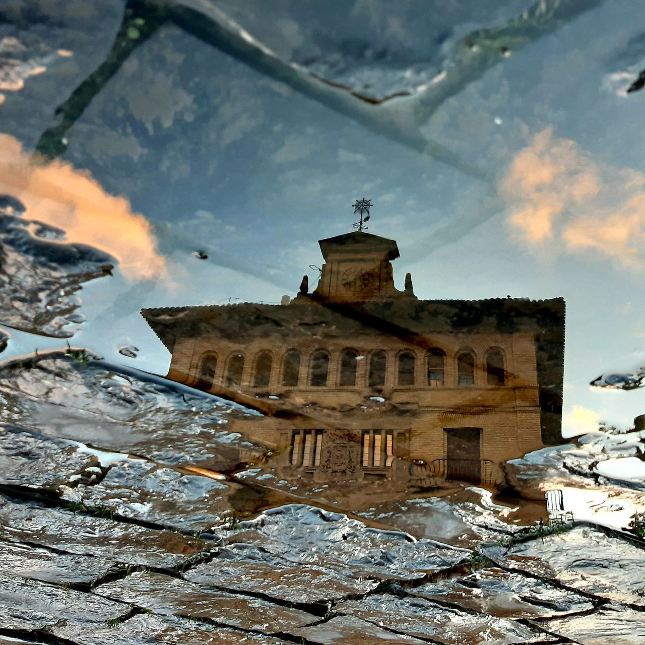 LOW ANGLE VIEW OF OLD BUILDING DURING WINTER