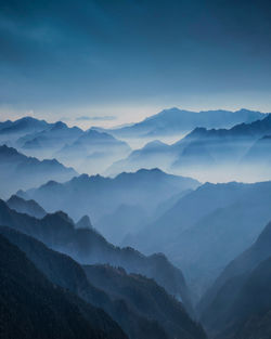 Scenic view of mountains against sky during sunset