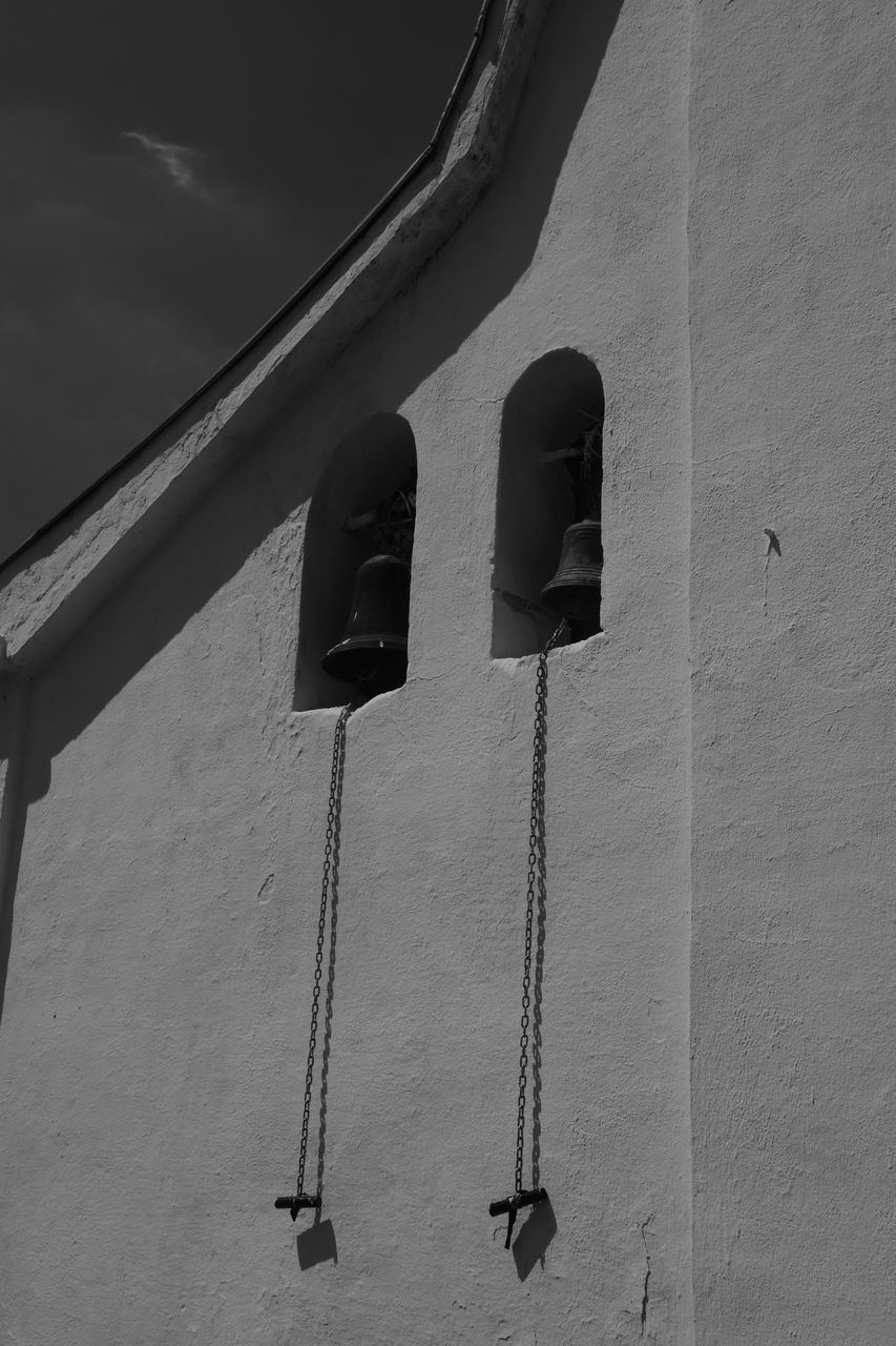 LOW ANGLE VIEW OF ROPES HANGING AGAINST SKY