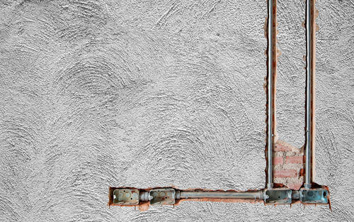 Close-up of pipes on wall