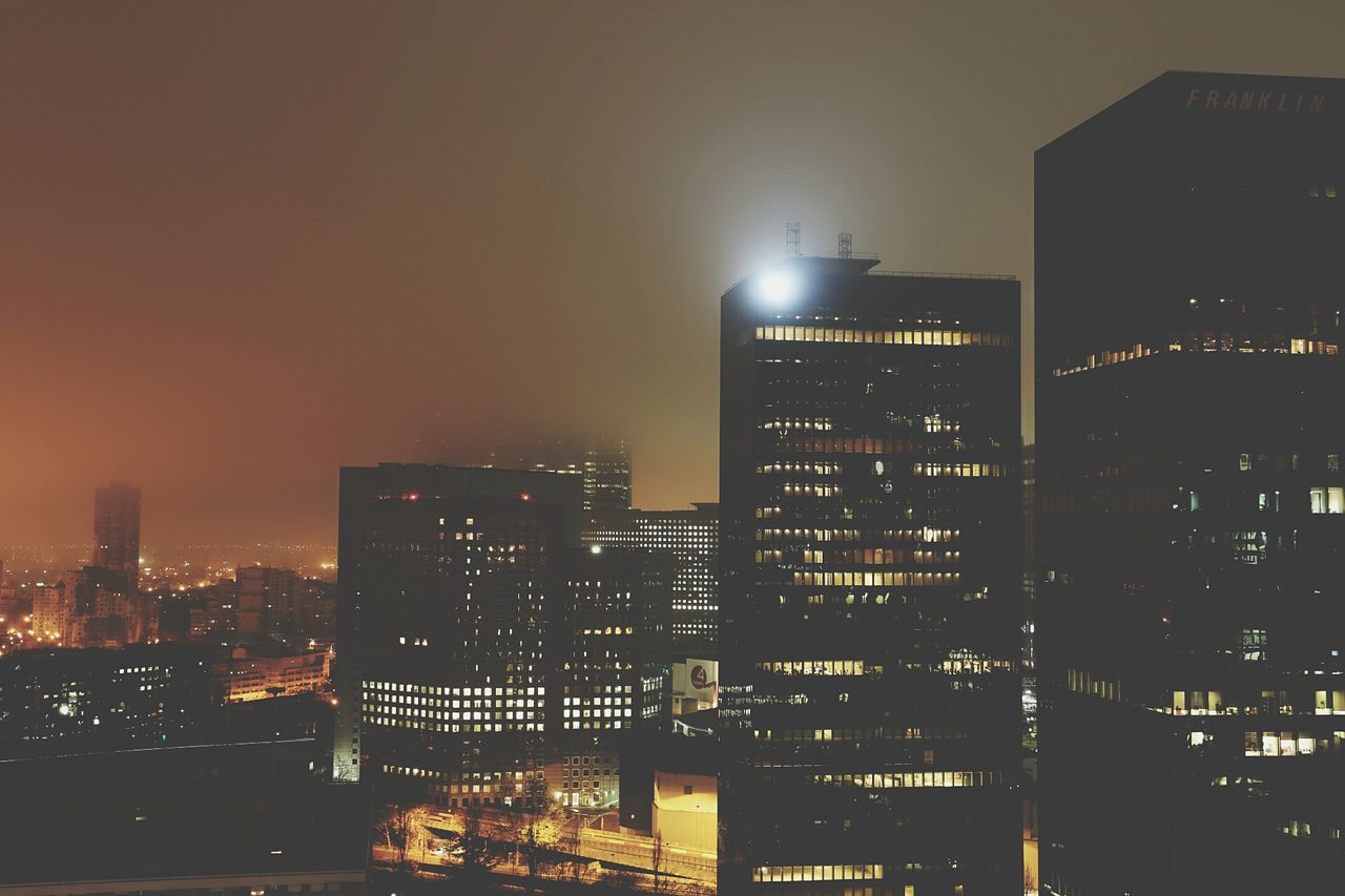 illuminated, building exterior, night, architecture, city, built structure, skyscraper, office building, modern, cityscape, city life, tower, building, tall - high, urban skyline, sky, residential building, dusk, outdoors, no people