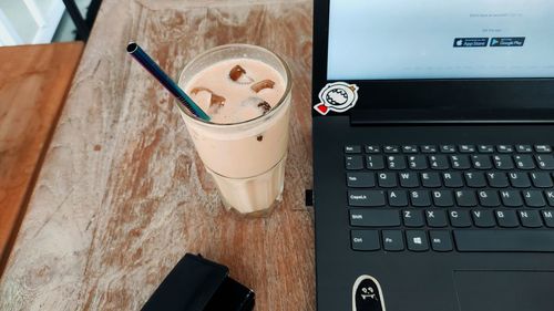 High angle view of coffee cup on table
