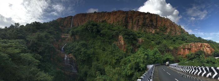 Panoramic view of mountain against cloudy sky