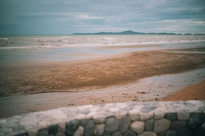 Scenic view of beach against sky