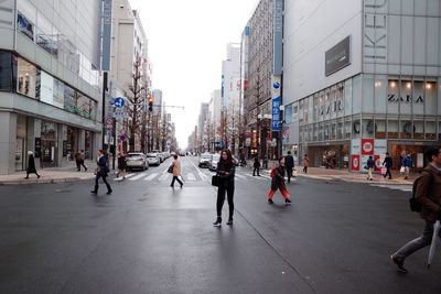 People walking on city street