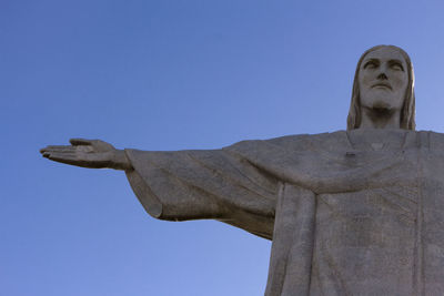 Low angle view of statue against clear sky