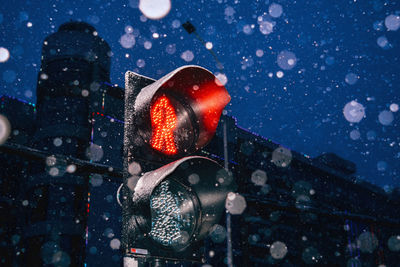 Illuminated signal on road at night