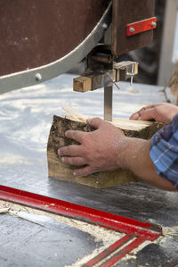 Low section of man working at construction site