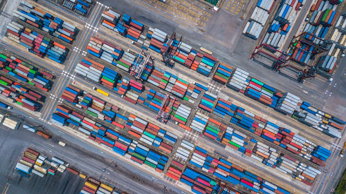 High angle view of container ship at commercial dock