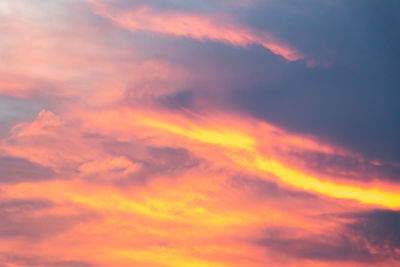 Low angle view of dramatic sky at sunset