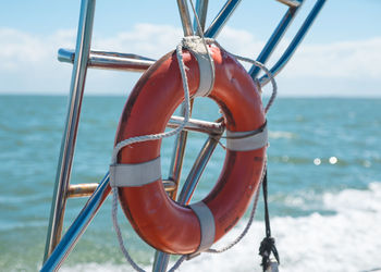 Close-up of inflatable ring hanging in boat